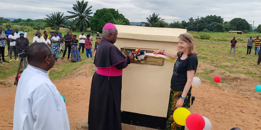 Bishop Martin and guest from Germany dedicate the cornerstone of St. Steven's Secondary School