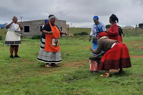 Daycare providers at Mzingisi daycare greet visitors from the Foundation