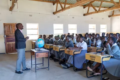 A class at St. Ignatius Secondary School taking geography lessons