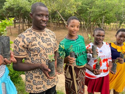 Students planting trees at St. Ignatius School in Malawi